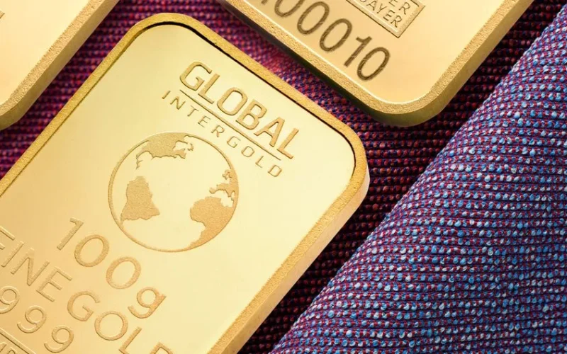 Close-up image of high-quality gold bars, symbolizing wealth and investment potential.