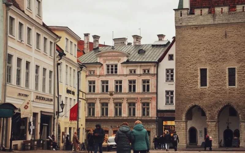 Charming street view of historic buildings in Tallinn's Old Town, Estonia.